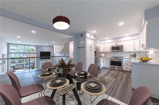 9000 Vanalden Ave Unit 176, Northridge, CA 91324 - dining room featuring wood finished floors and recessed lighting