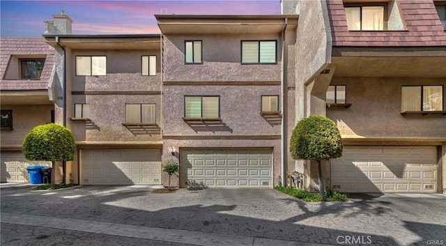 9000 Vanalden Ave Unit 176, Northridge, CA 91324 - view of property featuring a garage