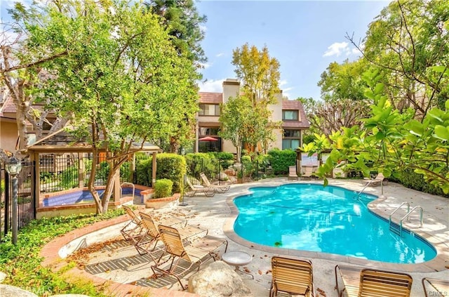 9000 Vanalden Ave Unit 176, Northridge, CA 91324 - community pool featuring a patio