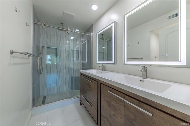 9000 Vanalden Ave Unit 176, Northridge, CA 91324 - bathroom featuring a marble finish shower, double vanity, tile patterned floors, and recessed lighting