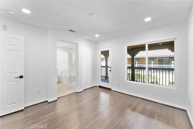 456 W Linden Dr, Orange, CA 92865 - spare room with wood finished floors and recessed lighting