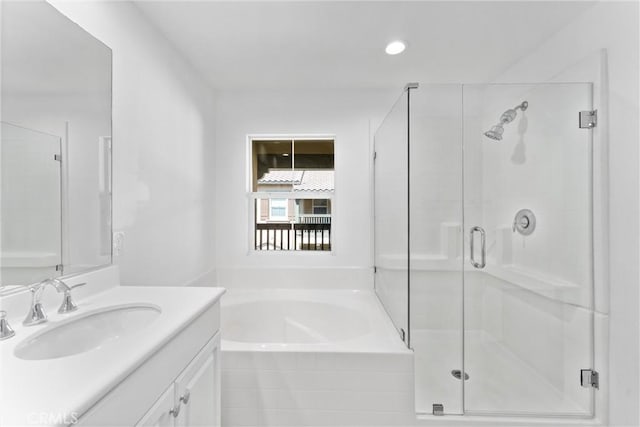 456 W Linden Dr, Orange, CA 92865 - full bathroom featuring vanity, a garden tub, and a shower stall