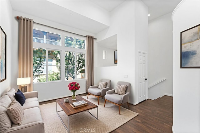456 W Linden Dr, Orange, CA 92865 - living room featuring healthy amount of natural light, dark wood-style flooring, a towering ceiling, and recessed lighting