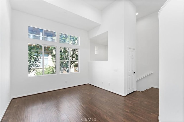 456 W Linden Dr, Orange, CA 92865 - spare room featuring healthy amount of natural light, dark wood-type flooring, a high ceiling, and recessed lighting