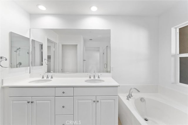 456 W Linden Dr, Orange, CA 92865 - full bath featuring a garden tub, double vanity, a shower with shower door, and recessed lighting
