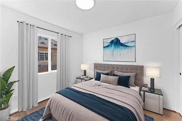 456 W Linden Dr, Orange, CA 92865 - bedroom with baseboards and light wood-style flooring