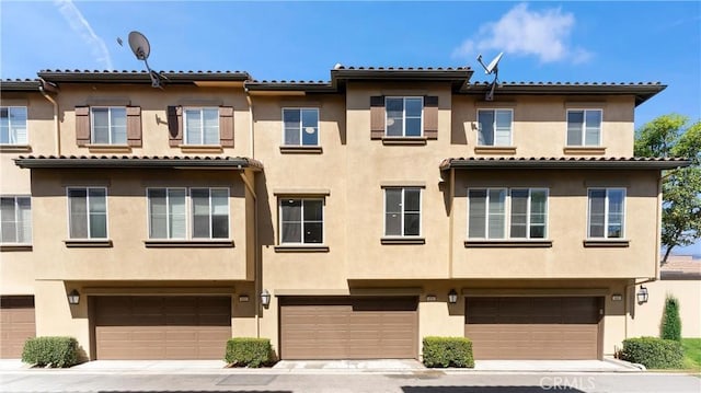 456 W Linden Dr, Orange, CA 92865 - mediterranean / spanish-style house with an attached garage and stucco siding