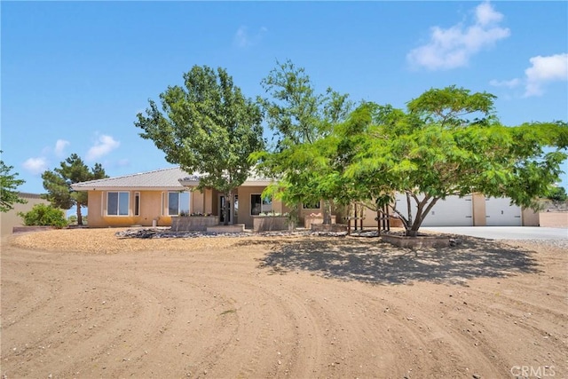 9525 Cambria Ct, Phelan, CA 92371 - view of front facade featuring driveway and stucco siding