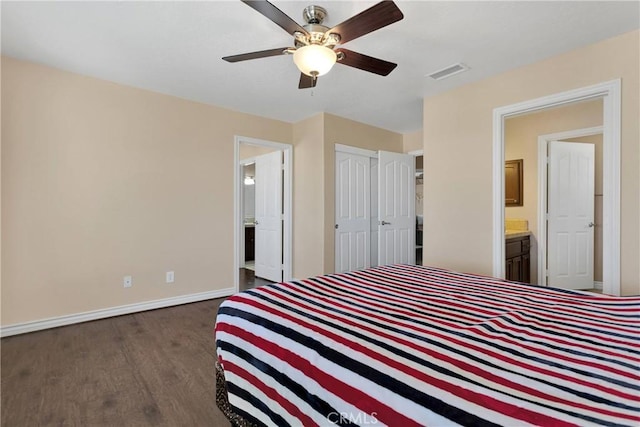 9525 Cambria Ct, Phelan, CA 92371 - bedroom with dark wood finished floors, ensuite bathroom, and ceiling fan