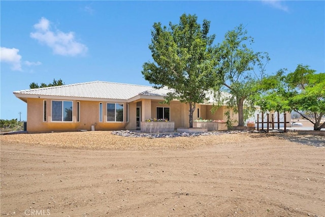 9525 Cambria Ct, Phelan, CA 92371 - view of front facade with a tiled roof and stucco siding