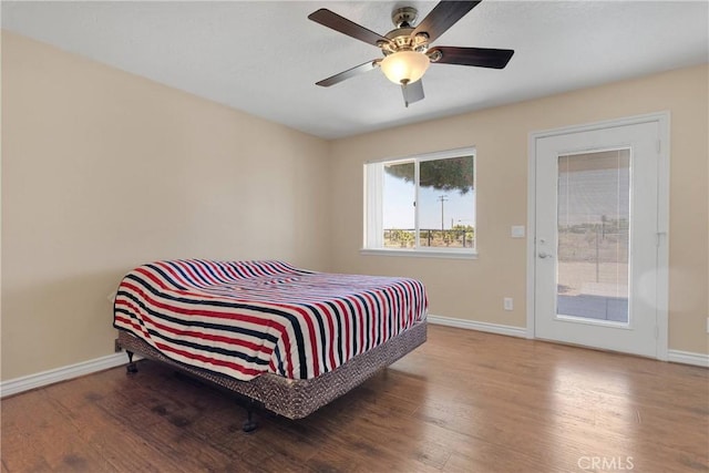 9525 Cambria Ct, Phelan, CA 92371 - bedroom featuring wood finished floors, access to outside, and ceiling fan