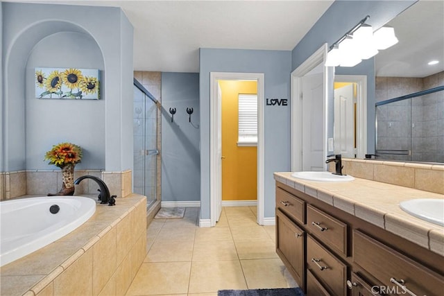 9525 Cambria Ct, Phelan, CA 92371 - full bath with a stall shower, a bath, double vanity, and tile patterned flooring