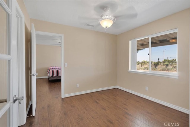 9525 Cambria Ct, Phelan, CA 92371 - empty room featuring dark wood-style floors and a ceiling fan