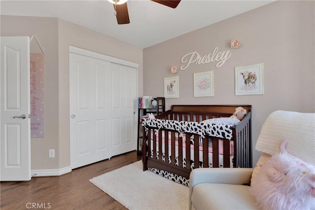 9525 Cambria Ct, Phelan, CA 92371 - bedroom with wood finished floors, a closet, and ceiling fan