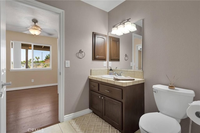 9525 Cambria Ct, Phelan, CA 92371 - bathroom featuring vanity, ceiling fan, and tile patterned floors