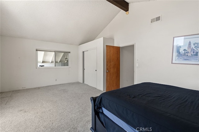 5230 Harbour Heights Ct, San Diego, CA 92109 - bedroom featuring beam ceiling, carpet floors, a closet, and high vaulted ceiling