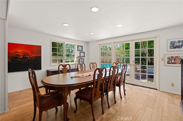 5230 Harbour Heights Ct, San Diego, CA 92109 - dining space with light wood-style floors, french doors, and recessed lighting