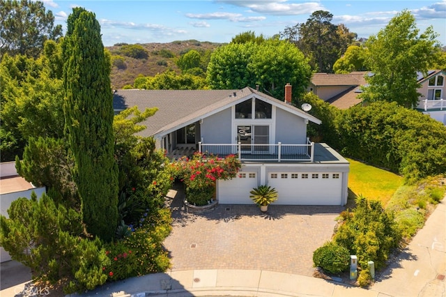 5230 Harbour Heights Ct, San Diego, CA 92109 - view of front of house with an attached garage, driveway, and stucco siding