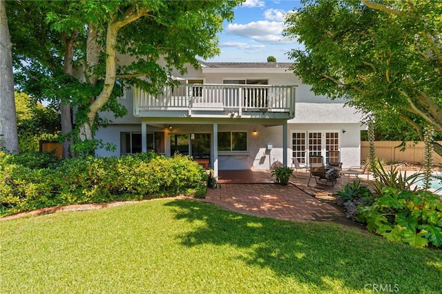 5230 Harbour Heights Ct, San Diego, CA 92109 - rear view of house with a balcony, stucco siding, a patio, and french doors