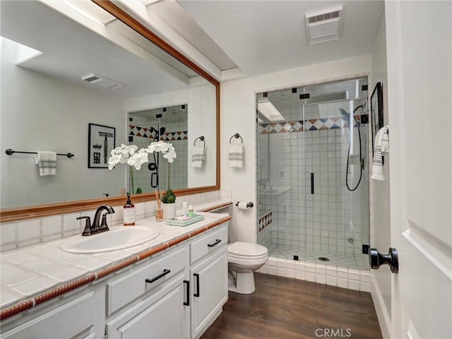 23034 Park Este, Calabasas, CA 91302 - bathroom featuring vanity, a shower stall, and wood finished floors