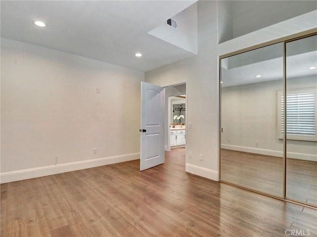 23034 Park Este, Calabasas, CA 91302 - unfurnished bedroom featuring wood finished floors, a closet, and recessed lighting