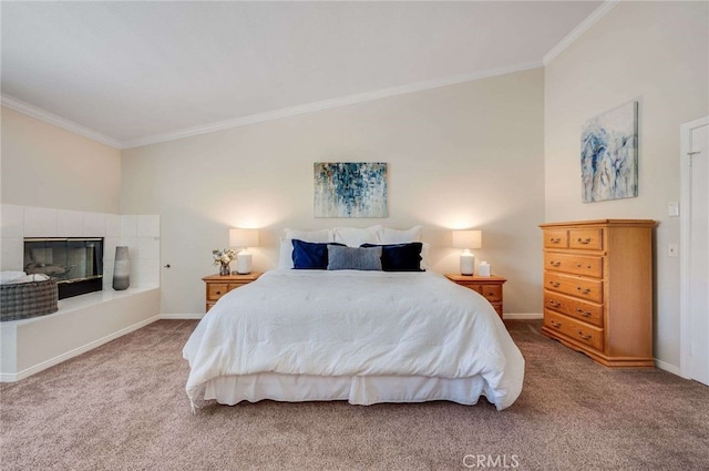 6140 Meadow Lark Dr, La Verne, CA 91750 - carpeted bedroom featuring ornamental molding, vaulted ceiling, and a tile fireplace