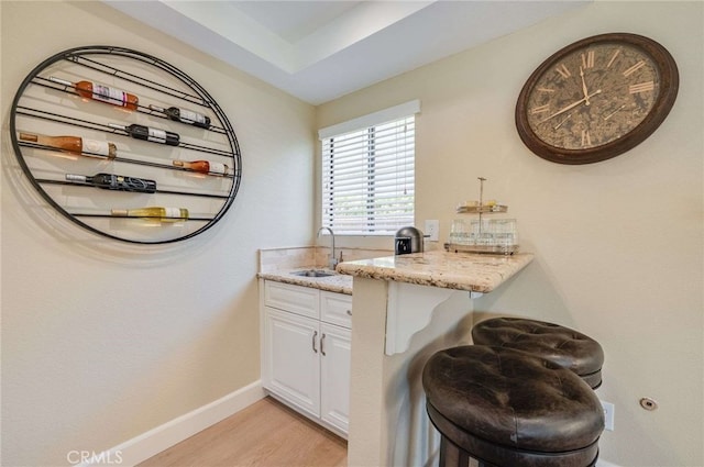 6140 Meadow Lark Dr, La Verne, CA 91750 - bar with a sink and light wood-style floors