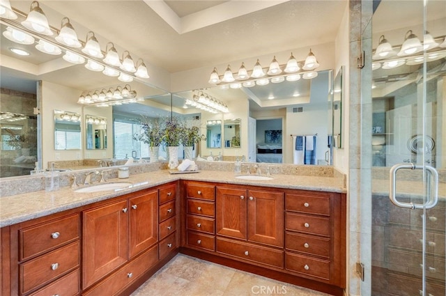 6140 Meadow Lark Dr, La Verne, CA 91750 - ensuite bathroom featuring double vanity, a stall shower, a tray ceiling, and tile patterned flooring
