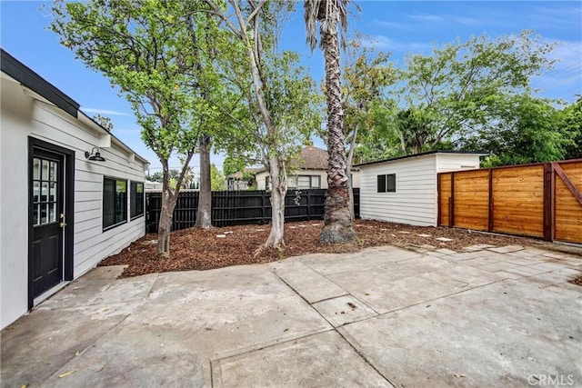 57 S Grand Oaks Ave, Pasadena, CA 91107 - fenced backyard with a patio area