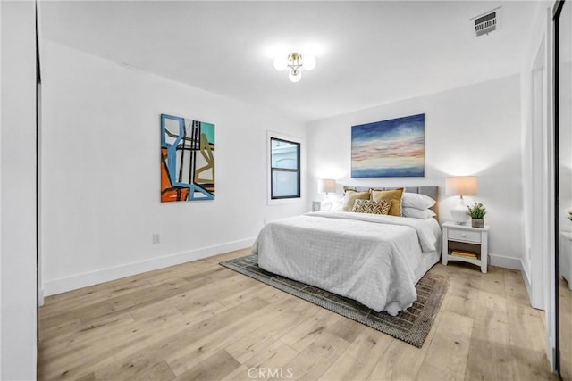 57 S Grand Oaks Ave, Pasadena, CA 91107 - bedroom featuring light wood-type flooring and baseboards