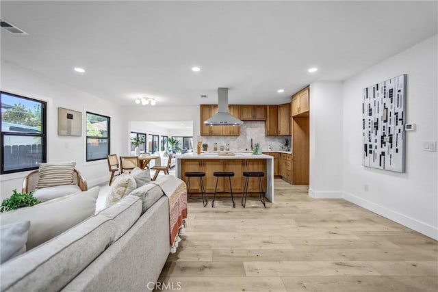 57 S Grand Oaks Ave, Pasadena, CA 91107 - living area featuring light wood-style flooring and recessed lighting