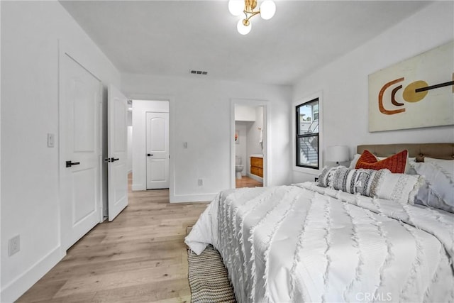 57 S Grand Oaks Ave, Pasadena, CA 91107 - bedroom featuring light wood-type flooring and ensuite bath