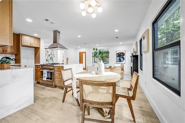 57 S Grand Oaks Ave, Pasadena, CA 91107 - dining area with light wood-style flooring and recessed lighting