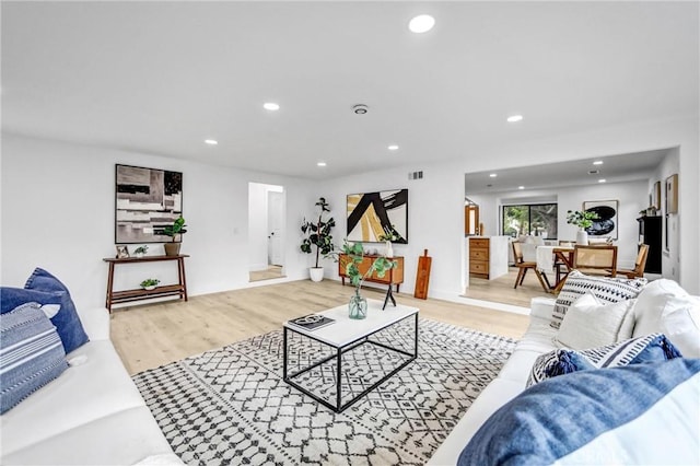 57 S Grand Oaks Ave, Pasadena, CA 91107 - living room featuring wood finished floors and recessed lighting