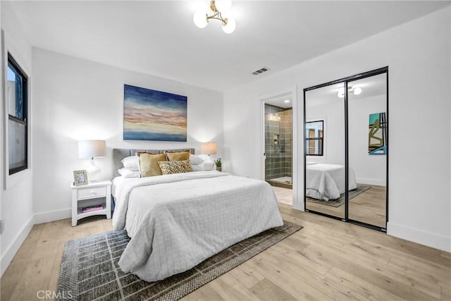 57 S Grand Oaks Ave, Pasadena, CA 91107 - bedroom with light wood-style floors and ensuite bath