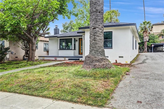 57 S Grand Oaks Ave, Pasadena, CA 91107 - view of front facade with a chimney, crawl space, stucco siding, a front yard, and asphalt driveway