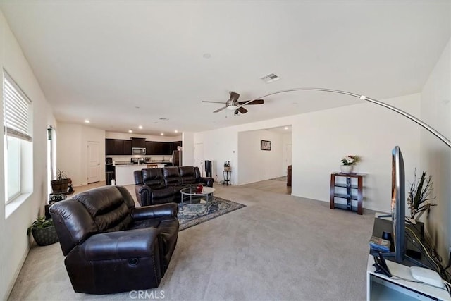 16814 Desert Star St, Victorville, CA 92394 - living room featuring light carpet, a ceiling fan, and recessed lighting