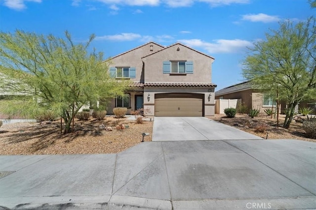 16814 Desert Star St, Victorville, CA 92394 - mediterranean / spanish home featuring driveway, stucco siding, a garage, and a tiled roof