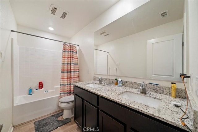 16814 Desert Star St, Victorville, CA 92394 - bathroom with wood finished floors, shower / bathtub combination with curtain, and double vanity