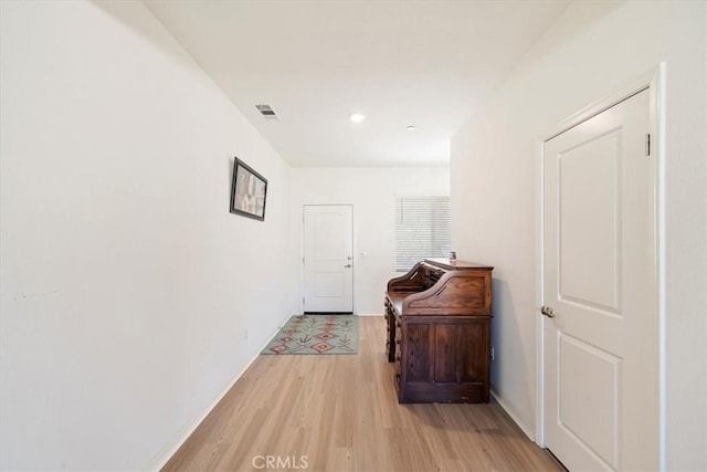 16814 Desert Star St, Victorville, CA 92394 - hallway with light wood-style flooring and baseboards