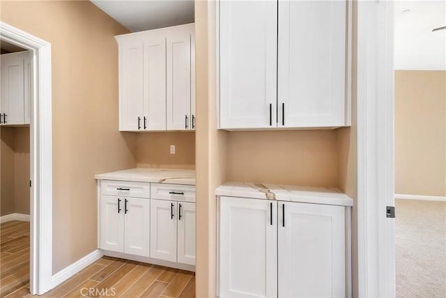 11228 Mockingbird, Apple Valley, CA 92308 - detailed view of baseboards and wood finished floors