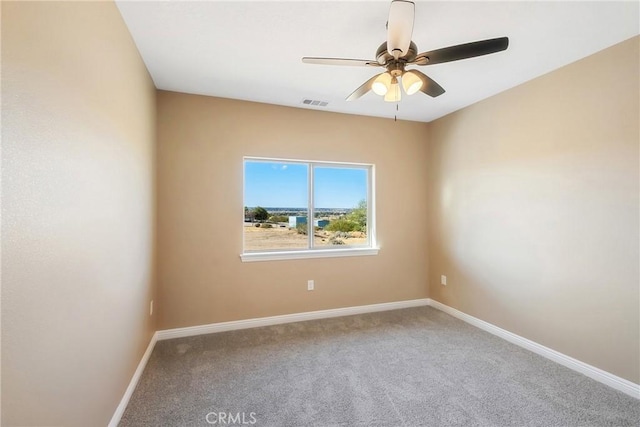 11228 Mockingbird, Apple Valley, CA 92308 - spare room featuring carpet flooring and a ceiling fan