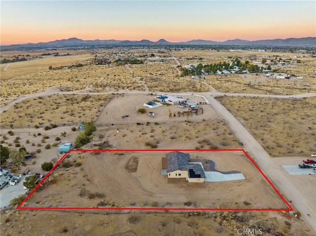 11228 Mockingbird, Apple Valley, CA 92308 - view of rural area featuring a mountainous background and property parcel outlined