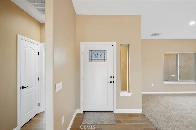11228 Mockingbird, Apple Valley, CA 92308 - foyer entrance with wood finish floors and baseboards