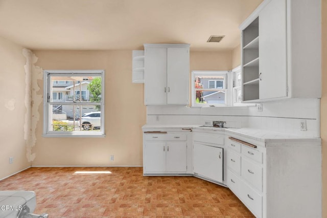 4127 Scandia Way, Los Angeles, CA 90065 - kitchen featuring open shelves, white cabinets, tile countertops, and backsplash