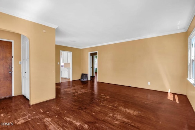4127 Scandia Way, Los Angeles, CA 90065 - unfurnished room with wood finished floors, ornamental molding, and arched walkways