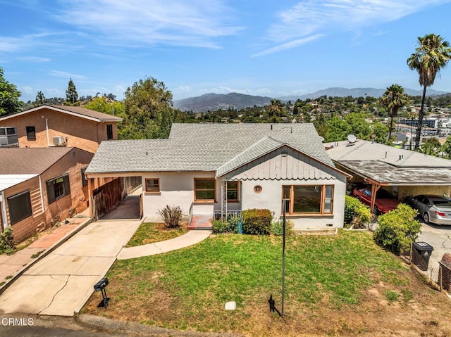 4127 Scandia Way, Los Angeles, CA 90065 - view of front of property with an attached carport, concrete driveway, a front yard, a mountain view, and a shingled roof