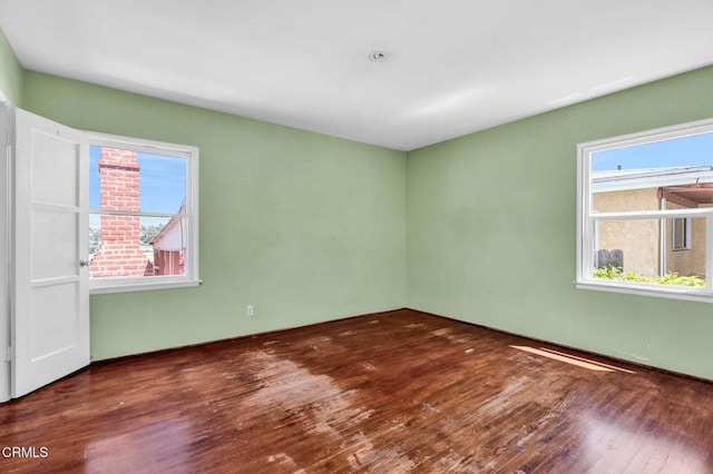 4127 Scandia Way, Los Angeles, CA 90065 - empty room with healthy amount of natural light and wood finished floors