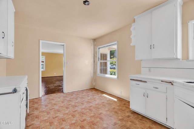 4127 Scandia Way, Los Angeles, CA 90065 - kitchen featuring white cabinets, tile counters, and brick patterned flooring