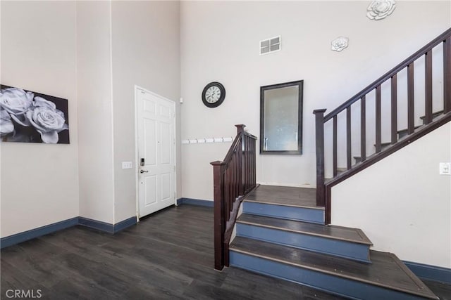 26 Billings Ave, Beaumont, CA 92223 - entryway with wood finished floors, stairway, and a towering ceiling